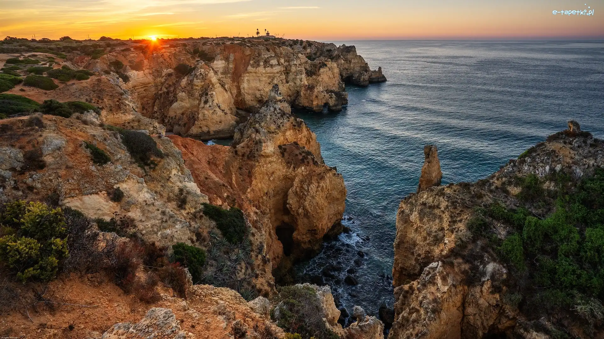 Wschód słońca, Cypel, Ponta da Piedade, Region Algarve, Portugalia, Skały, Morze