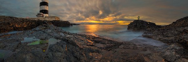 Irlandia, Skały, Chmury, Morze, Latarnia morska Hook Head, Wexford, Zachód słońca