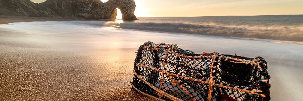 Plaża, Skały, Wschód słońca, Łuk wapienny Durdle Door, Wybrzeże Jurajskie, Anglia, Hrabstwo Dorset, Morze, Kosz