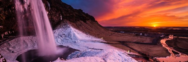 Seljalandsfoss, Skały, Wodospad, Islandia, Zachód słońca, Zima