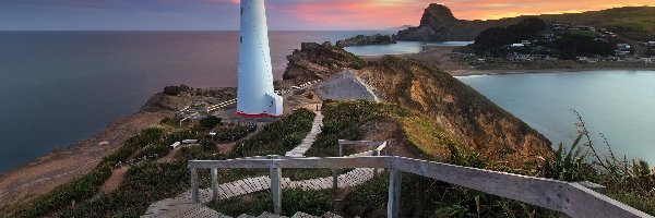 Castlepoint, Zachód słońca, Schody, Brzeg, Nowa Zelandia, Skały, Latarnia morska, Rośliny, Kamienie, Ocean, Poręcz