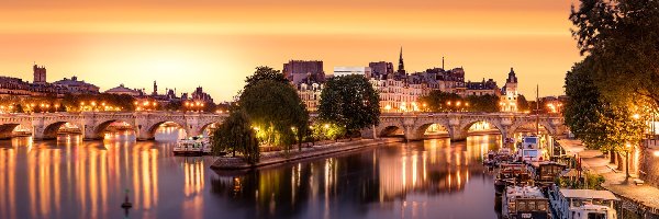 Most Pont Neuf, Paryż, Światła, Drzewa, Rzeka Sekwana, Domy, Łodzie, Francja