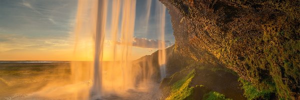 Islandia, Rozświetlony, Skały, Promienie słońca, Wodospad Seljalandsfoss